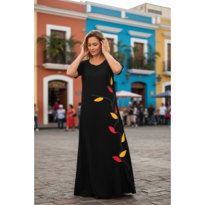 Minimal μπροστά, μοναδικό στο πλάι. Μακρύ μαύρο φόρεμα με πολύχρωμο σχέδιο φύλλων που δίνει χαρακτήρα και κομψότητα σε κάθε εμφάνιση.Βαμβάκι 100% Μήκος από ώμο 135εκ.
