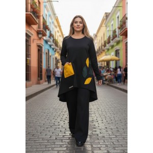 Mπλουζοφόρεμα Ασύμμετρο μαυρό, στρόγγυλη λαιμόκοψη, τσέπι σε χρώμα κίτρινο,  μακρύ μανίκι, μήκος 80εκ μπροστινό μέρος και πίσω μέρος 90εκ.,  Βαμβάκι 95% ελαστάν 5%, με σχέδιο φυλλαράκια