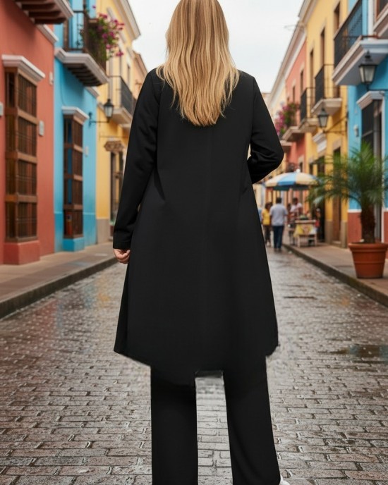 Mπλουζοφόρεμα Ασύμμετρο μαυρό, στρόγγυλη λαιμόκοψη, τσέπι σε χρώμα κίτρινο,  μακρύ μανίκι, μήκος 80εκ μπροστινό μέρος και πίσω μέρος 90εκ.,  Βαμβάκι 95% ελαστάν 5%, με σχέδιο φυλλαράκια