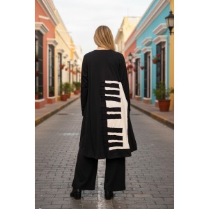 Μπλουζοφόρεμα ασύμμετρο,μαύρο, με στρόγγυλη λαιμόκοψη , μακρύ μανίκι, μήκος 80εκ μπροστινό μέρος και πίσω μέρος 90εκ.,ύφασμα Βαμβάκι95% ελαστάν 5%, σχέδιο    Ηarmonically